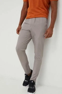 Ανδρικά Παντελόνια φόρμας Παντελόνι προπόνησης Under Armour Unstoppable γκρι