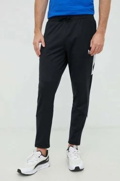Ανδρικά Παντελόνια φόρμας Παντελόνι προπόνησης Under Armour Tricot μαύρο